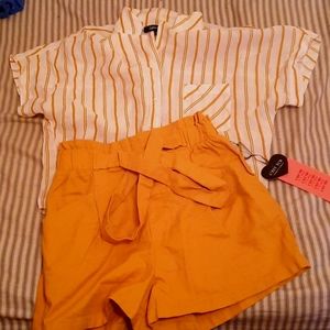 Both are new/haven't been worn/shorts are and flanel/cardigan are both medium